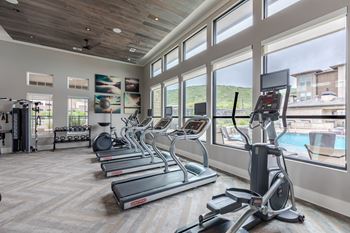 Fitness center with yoga studio, virtual trainer & towel service